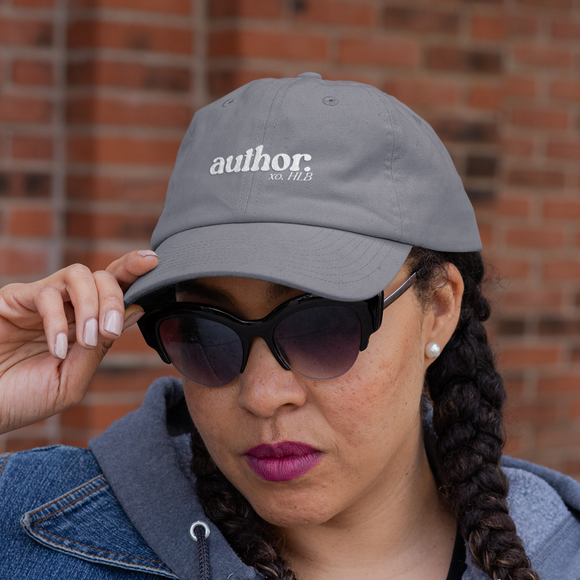 https://www.hellolovelybox.com/cdn/shop/files/dad-hat-mockup-featuring-a-woman-with-a-drink-on-her-hand-32430.png?v=1683208509&width=580